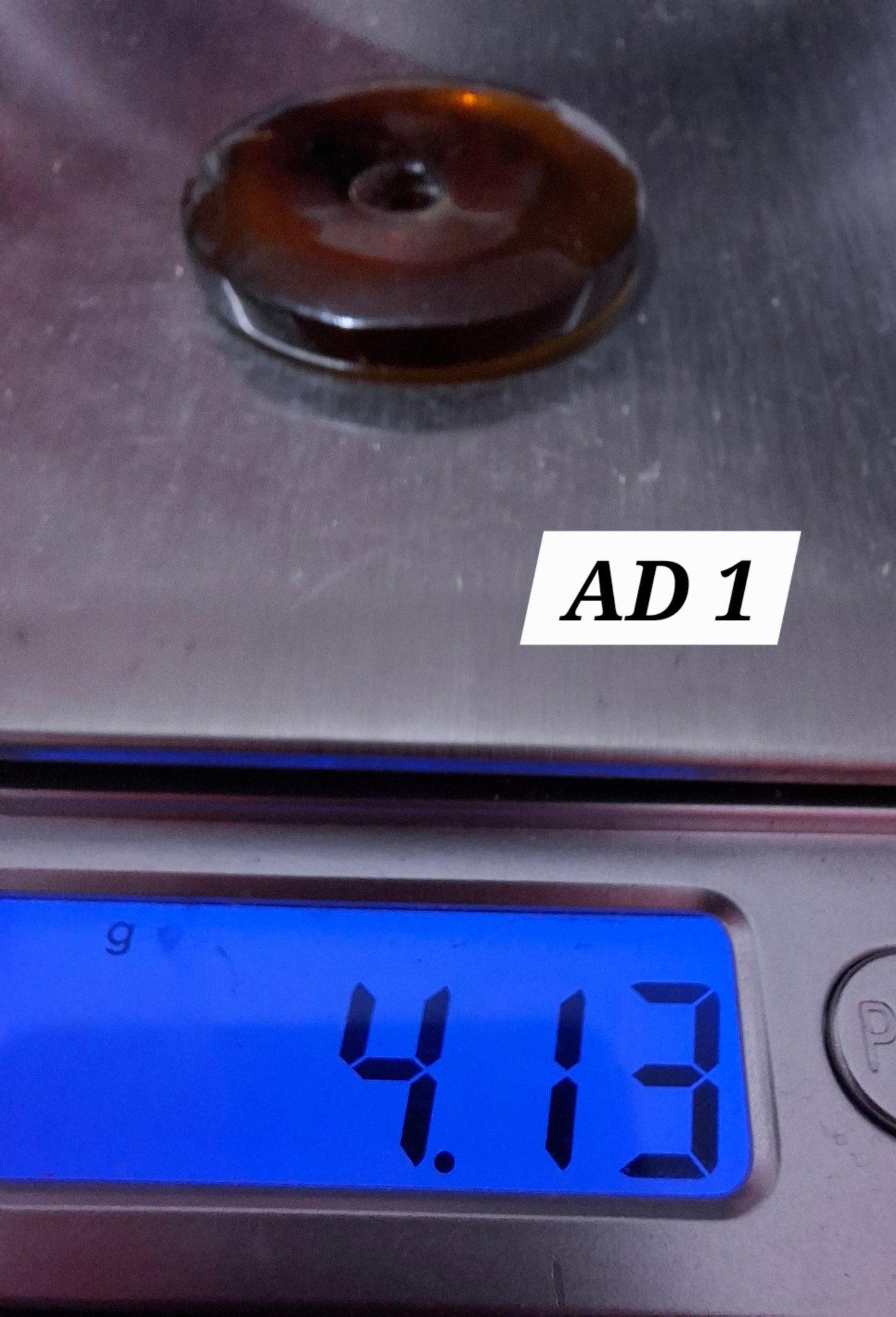 Red Amber Disc/Doughnut carving/sphere holder, 4.13g, Fossil (Ref: AD1)