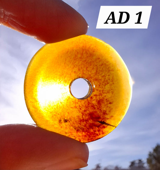 Red Amber Disc/Doughnut carving/sphere holder, 4.13g, Fossil (Ref: AD1)