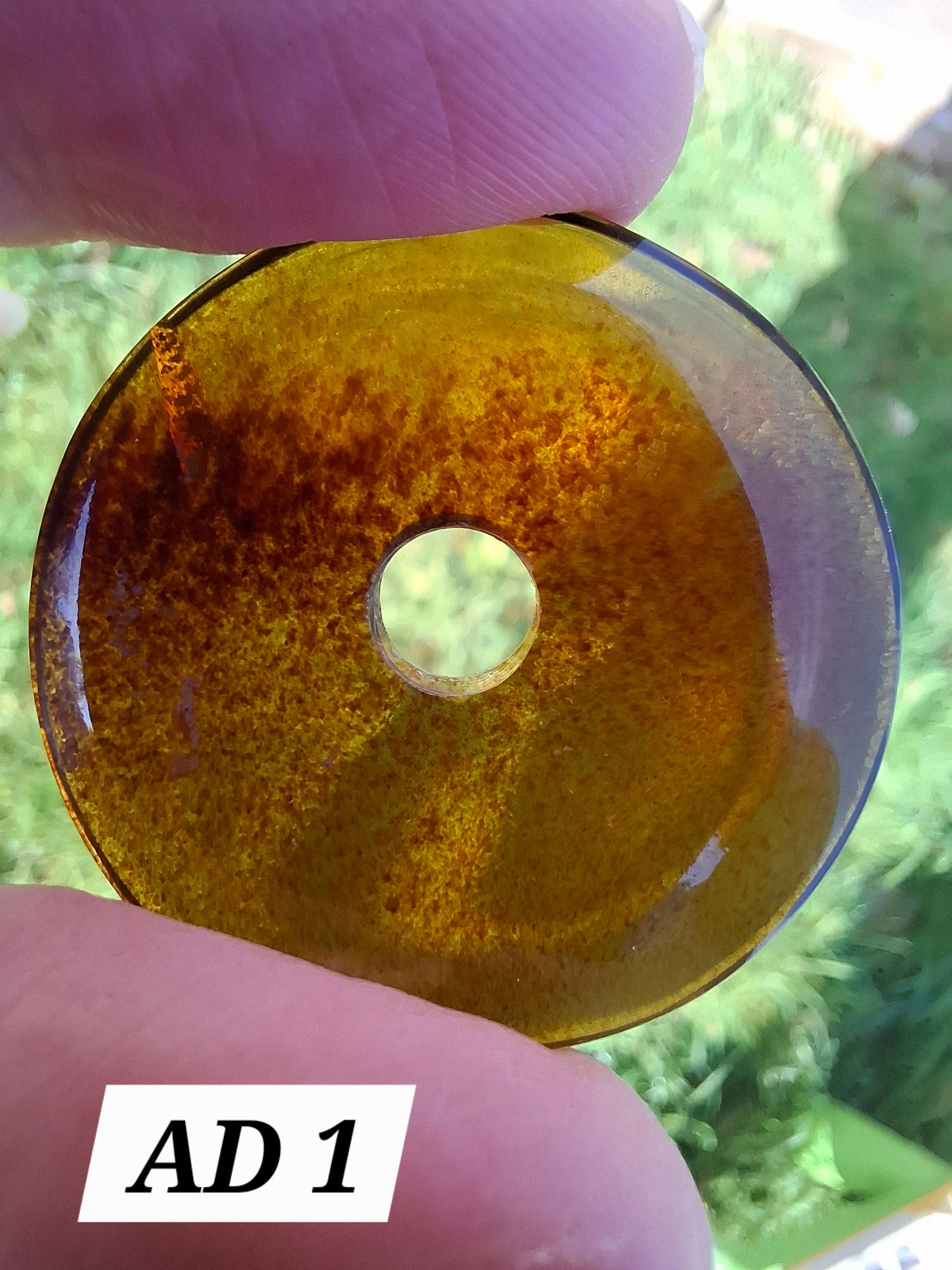 Red Amber Disc/Doughnut carving/sphere holder, 4.13g, Fossil (Ref: AD1)