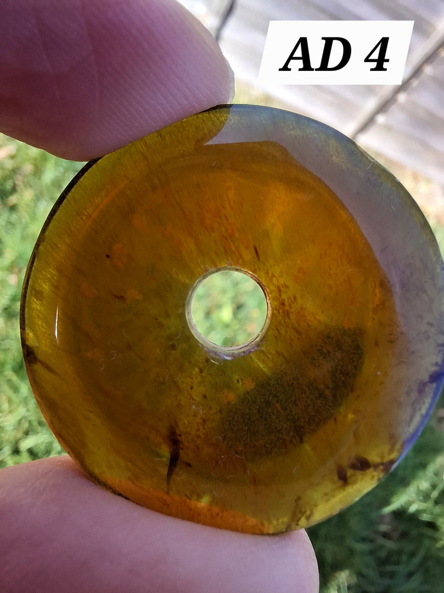 Red Amber Disc/Doughnut carving, sphere holder, 5.39g, Fossil (Ref: AD4)