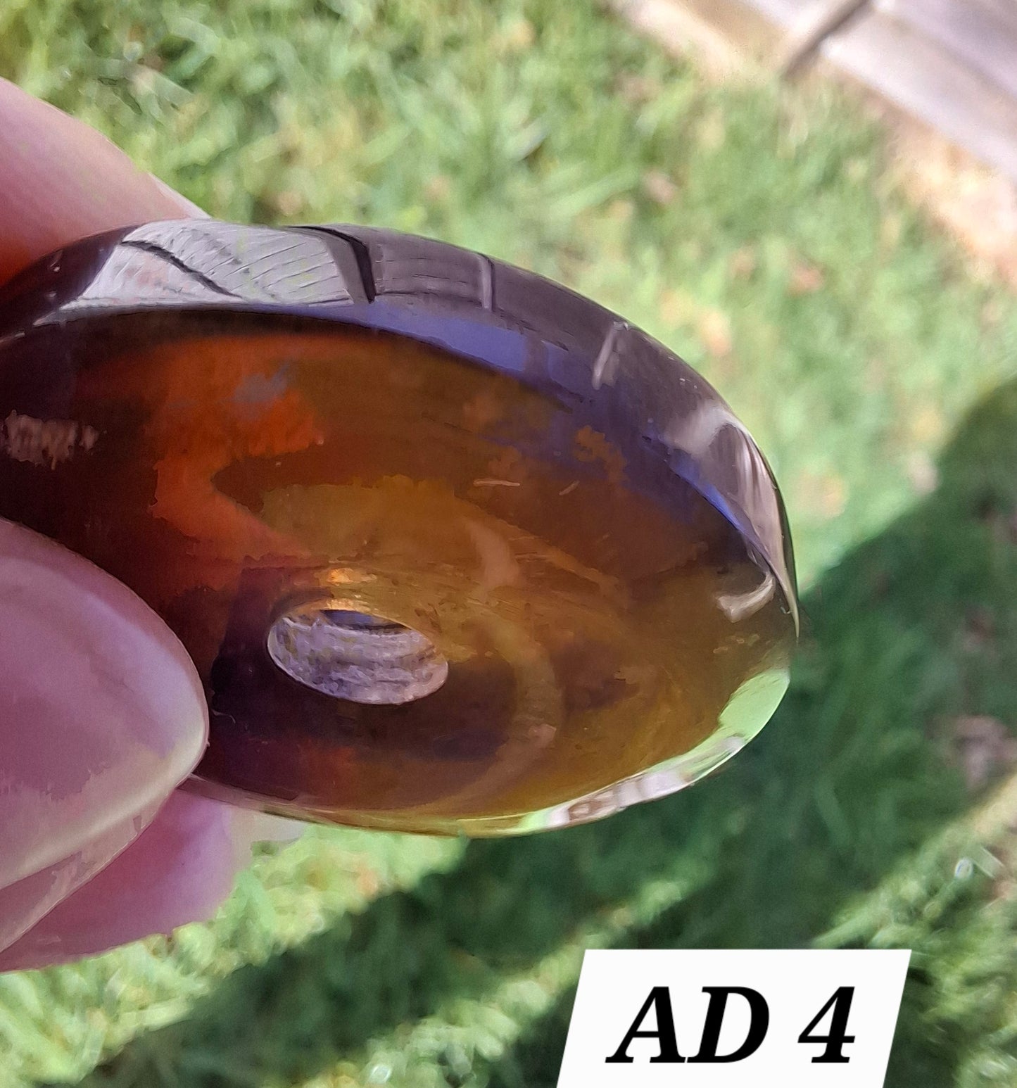 Red Amber Disc/Doughnut carving, sphere holder, 5.39g, Fossil (Ref: AD4)
