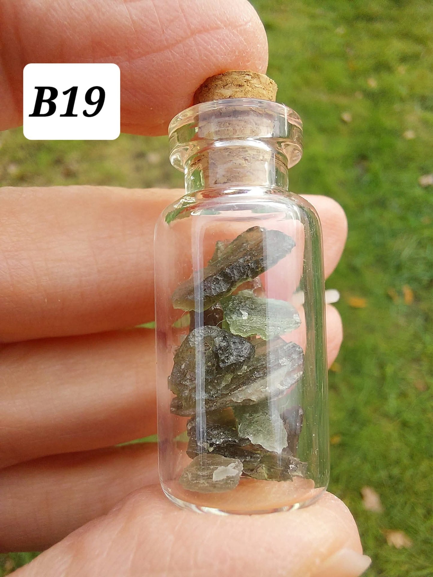 Moldavite chips (2.50g) in 3ml glass Bottle, Tektite (Ref: B19)