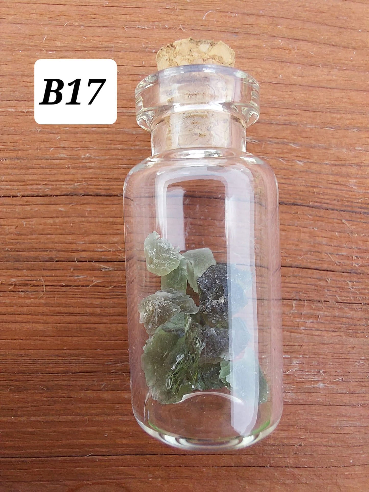 Moldavite chips (1.50g) in 3ml glass Bottle, Tektite (Ref: B17)