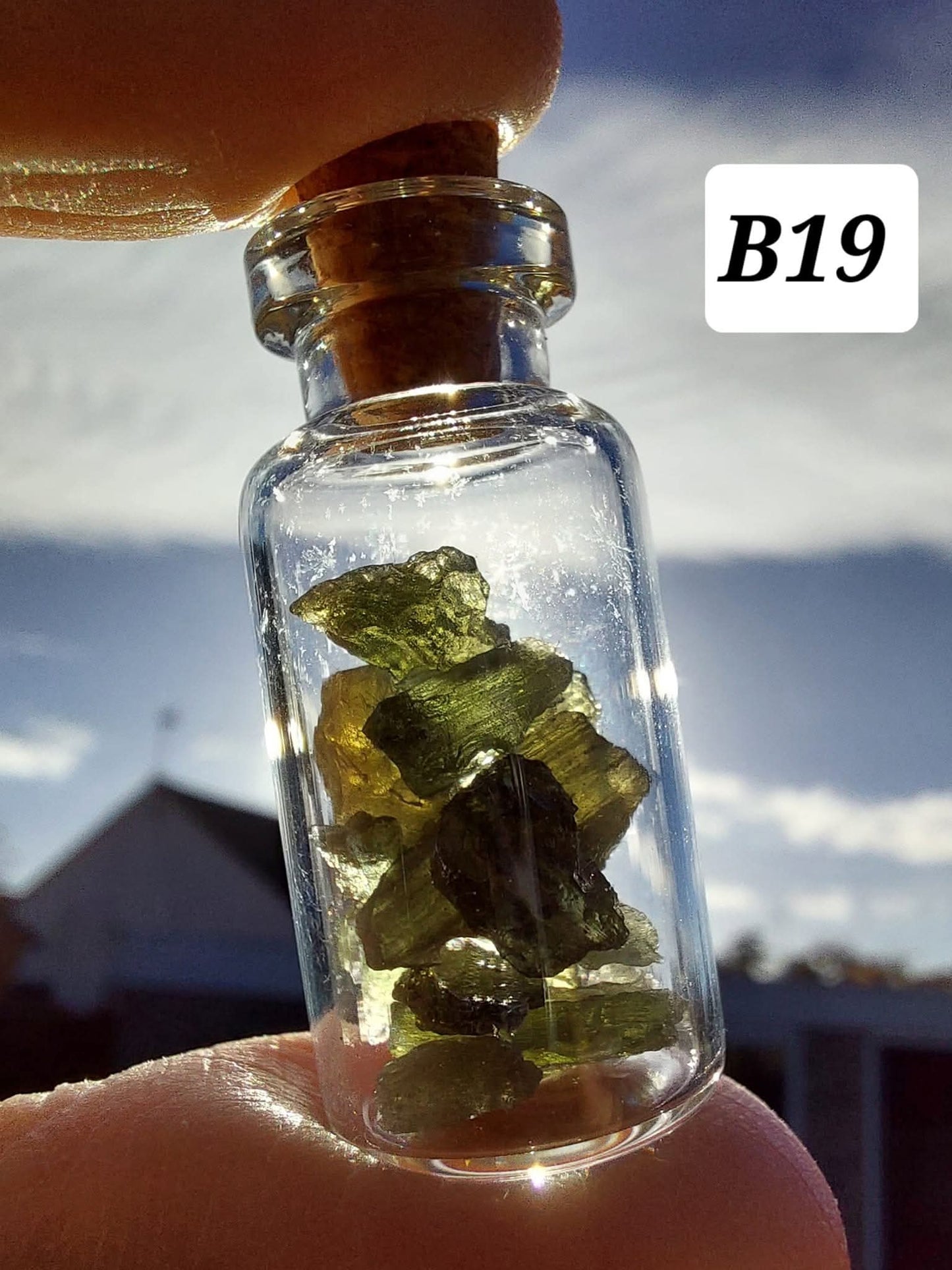 Moldavite chips (2.50g) in 3ml glass Bottle, Tektite (Ref: B19)