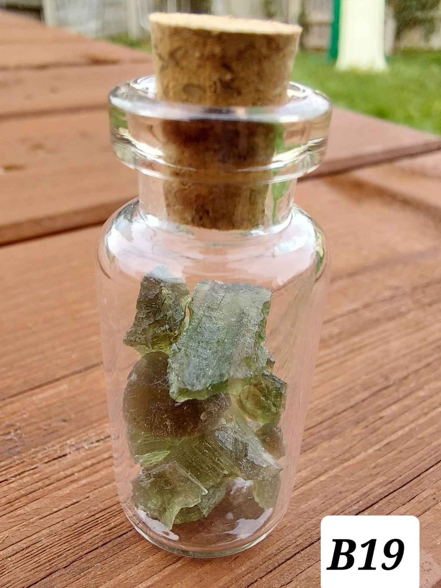 Moldavite chips (2.50g) in 3ml glass Bottle, Tektite (Ref: B19)