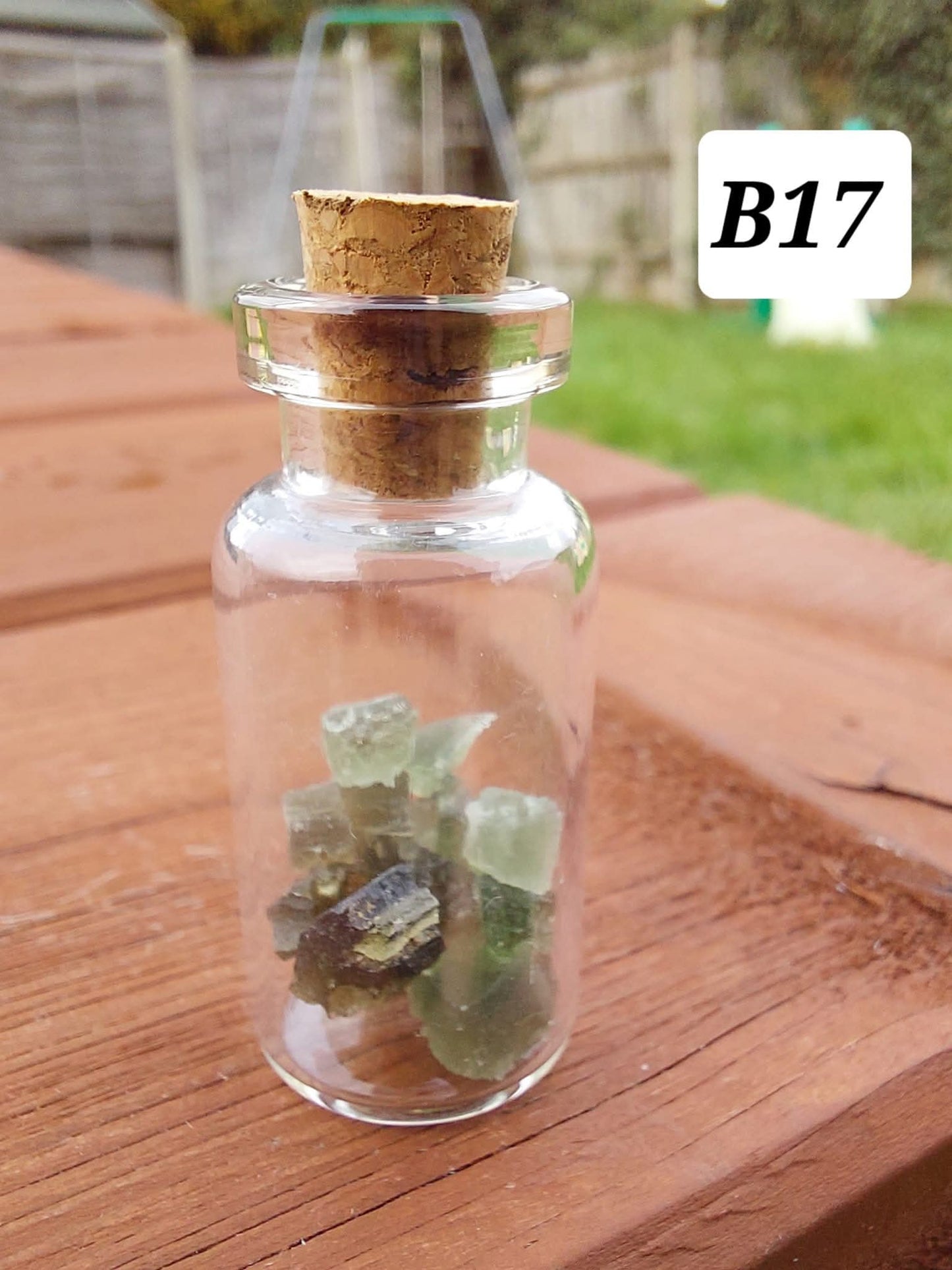 Moldavite chips (1.50g) in 3ml glass Bottle, Tektite (Ref: B17)