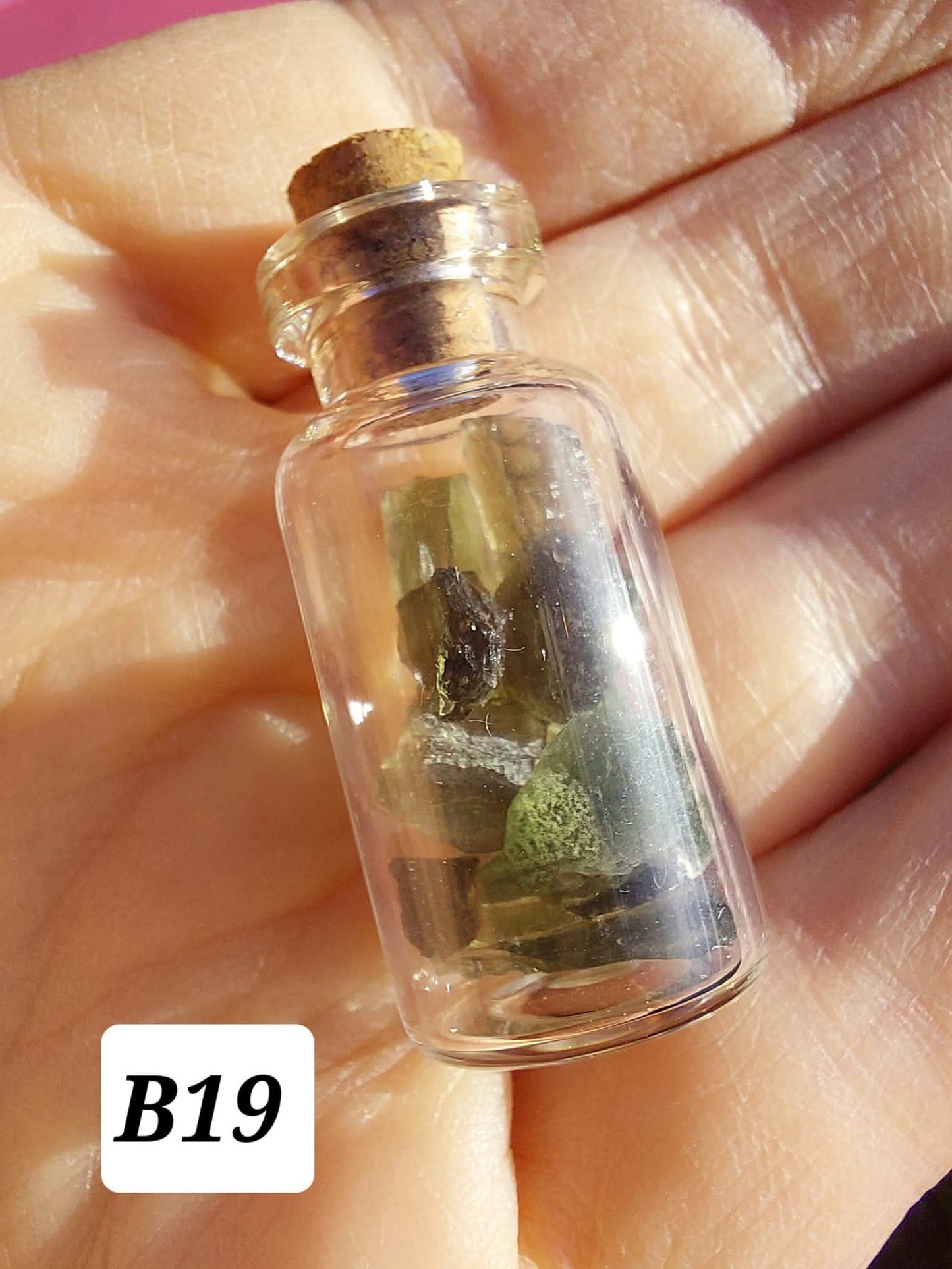 Moldavite chips (2.50g) in 3ml glass Bottle, Tektite (Ref: B19)