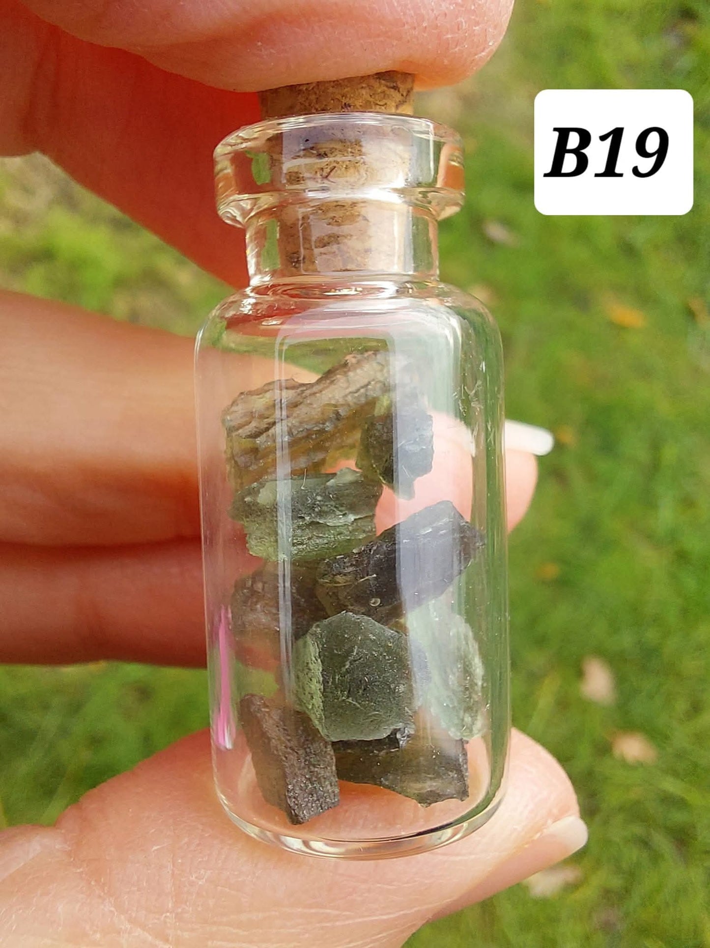 Moldavite chips (2.50g) in 3ml glass Bottle, Tektite (Ref: B19)