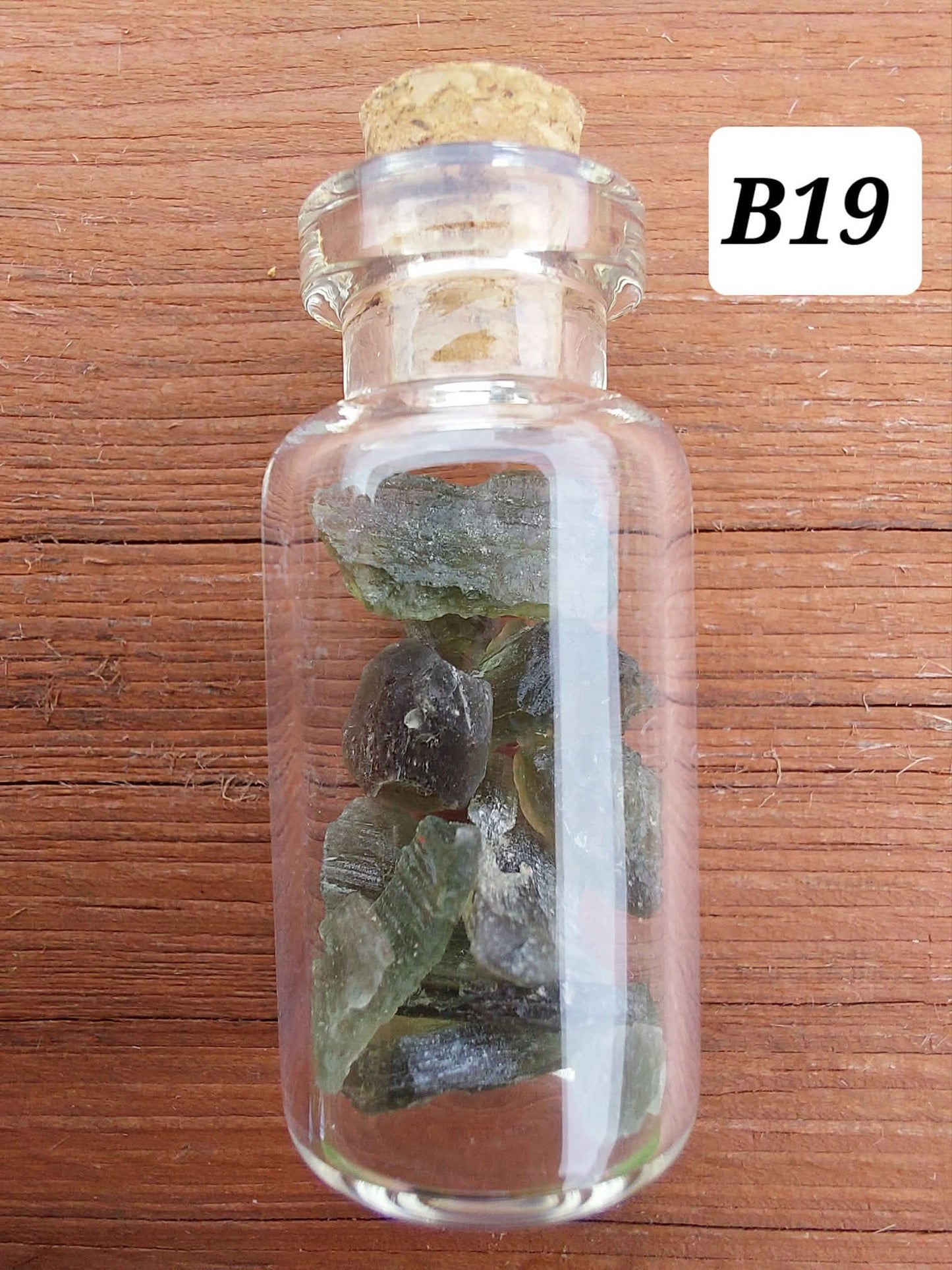 Moldavite chips (2.50g) in 3ml glass Bottle, Tektite (Ref: B19)