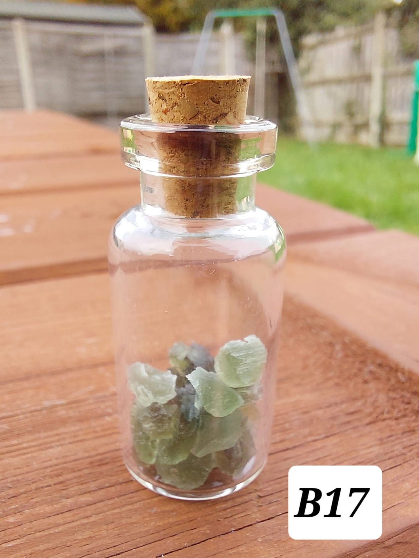 Moldavite chips (1.50g) in 3ml glass Bottle, Tektite (Ref: B17)