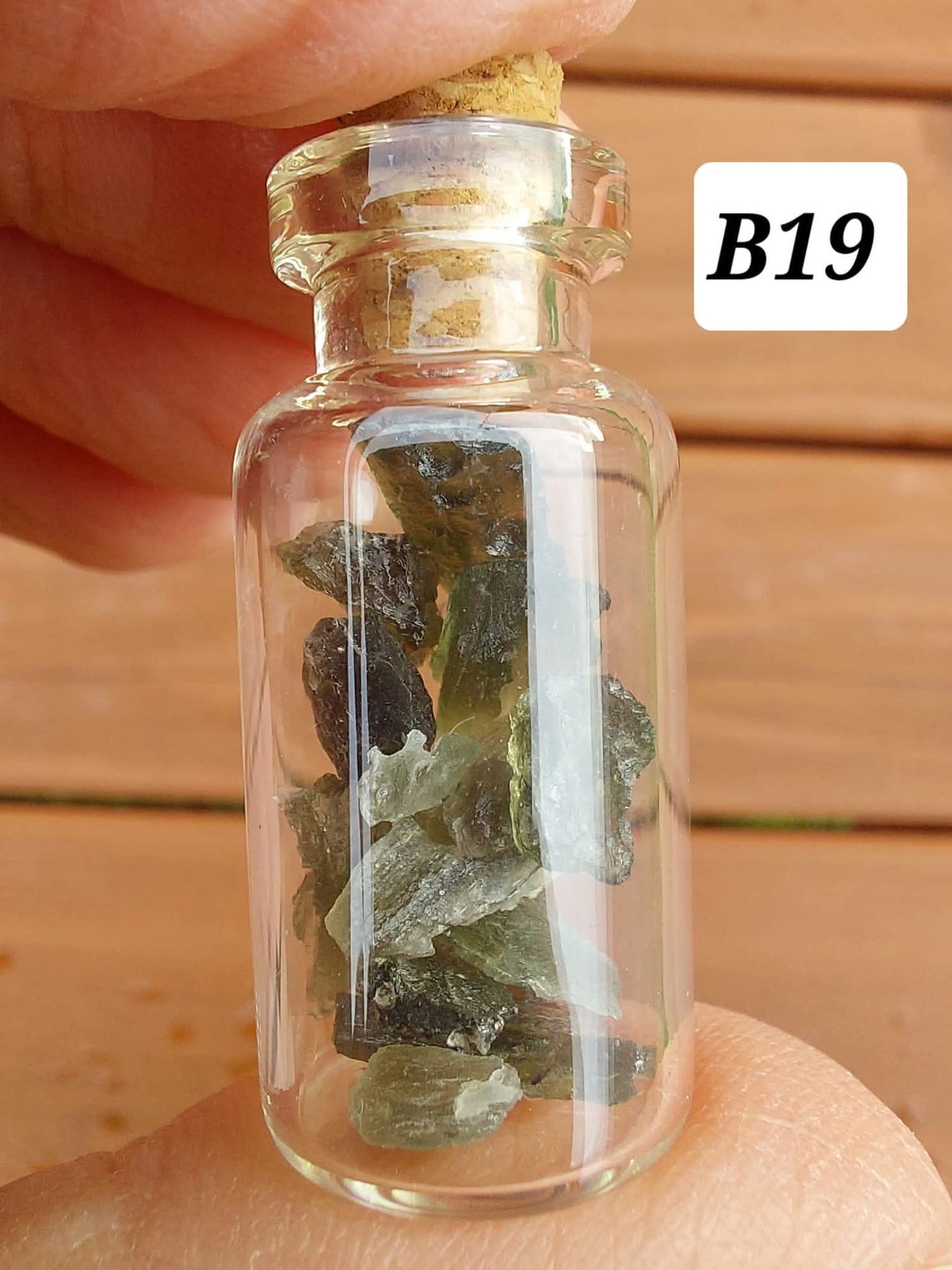 Moldavite chips (2.50g) in 3ml glass Bottle, Tektite (Ref: B19)
