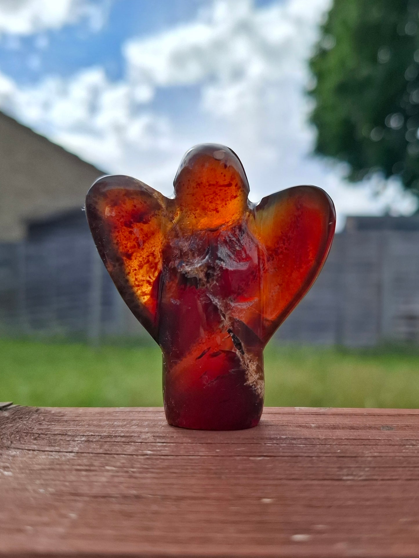Red Amber Angel, 26.36g, carving, Fossil (Ref: AA1)