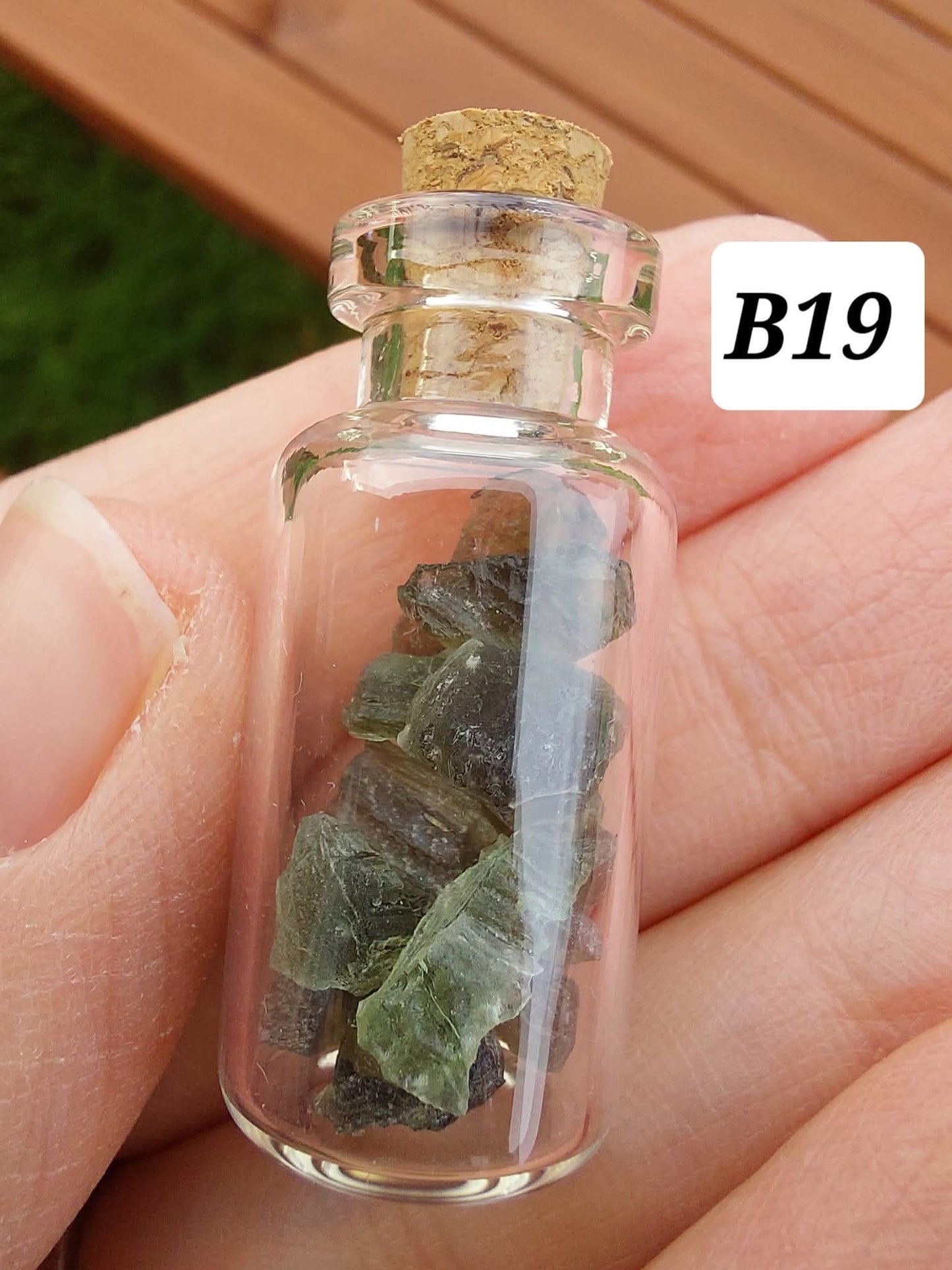 Moldavite chips (2.50g) in 3ml glass Bottle, Tektite (Ref: B19)