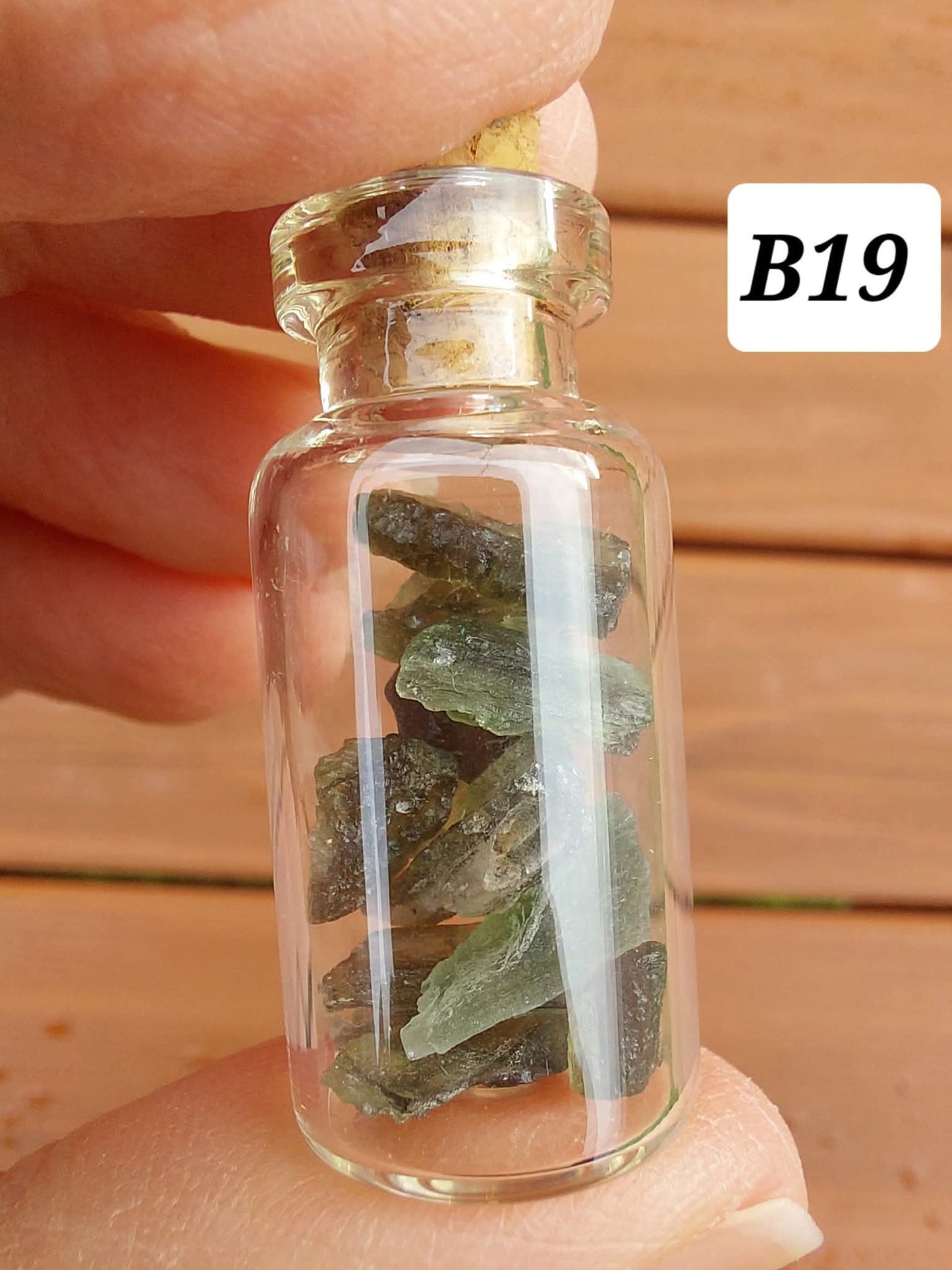 Moldavite chips (2.50g) in 3ml glass Bottle, Tektite (Ref: B19)
