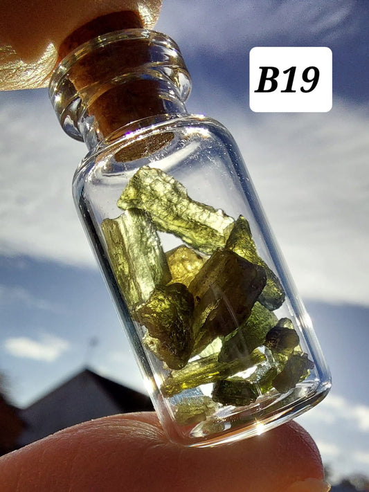 Moldavite chips (2.50g) in 3ml glass Bottle, Tektite (Ref: B19)
