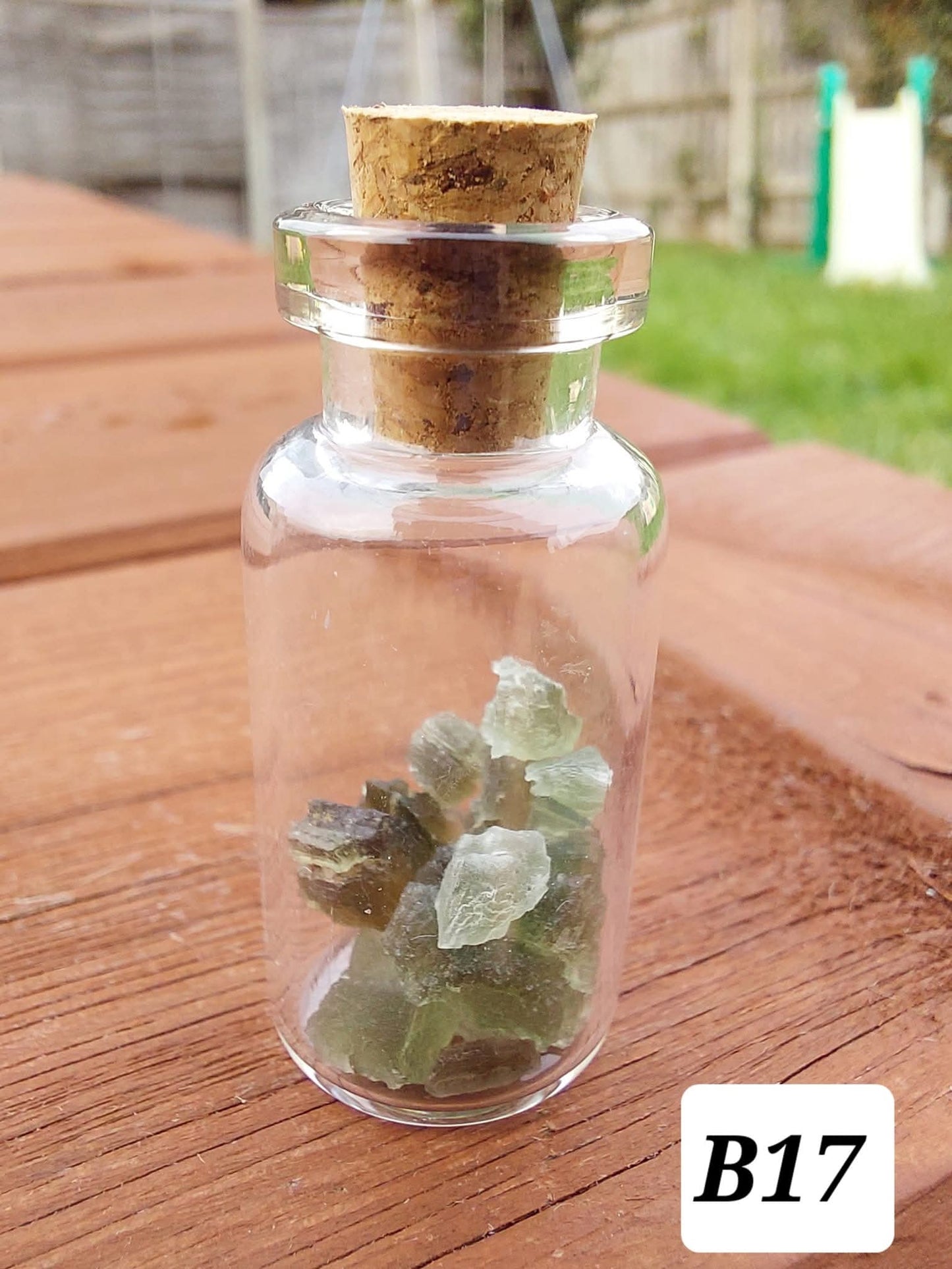 Moldavite chips (1.50g) in 3ml glass Bottle, Tektite (Ref: B17)