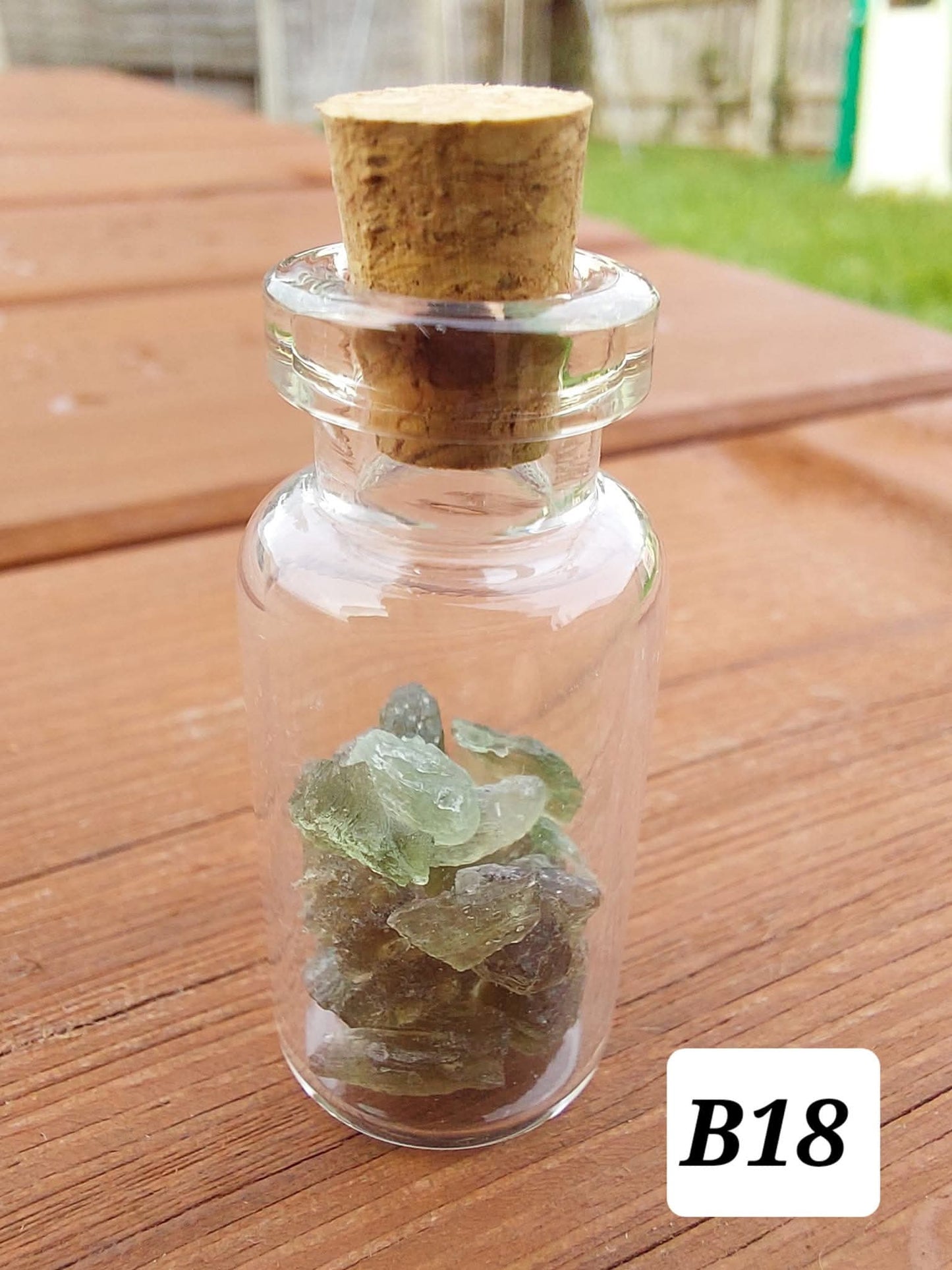 Moldavite chips (2.00g) in 3ml glass Bottle, Tektite (Ref: B18)