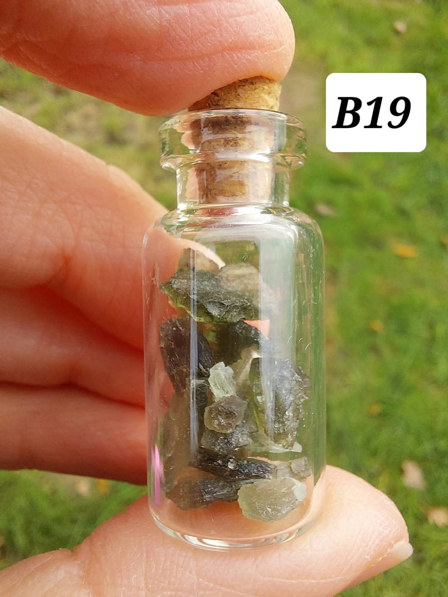 Moldavite chips (2.50g) in 3ml glass Bottle, Tektite (Ref: B19)