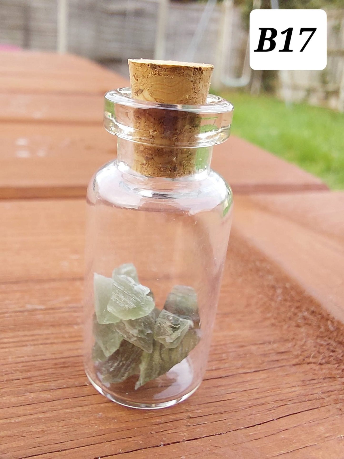 Moldavite chips (1.50g) in 3ml glass Bottle, Tektite (Ref: B17)