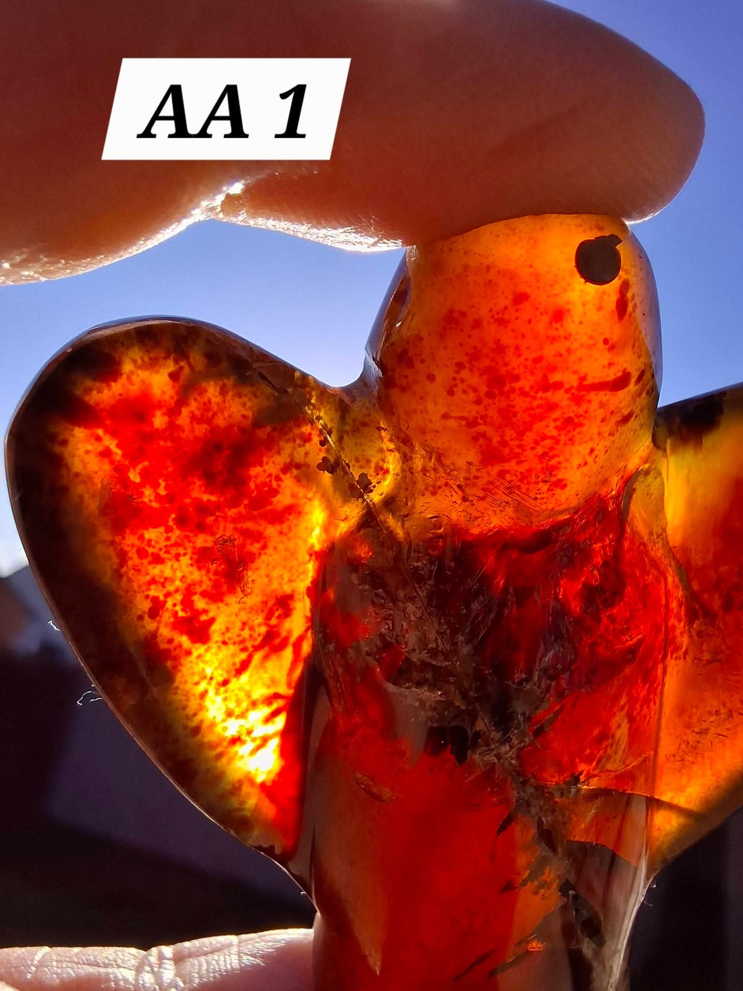 Red Amber Angel, 26.36g, carving, Fossil (Ref: AA1)
