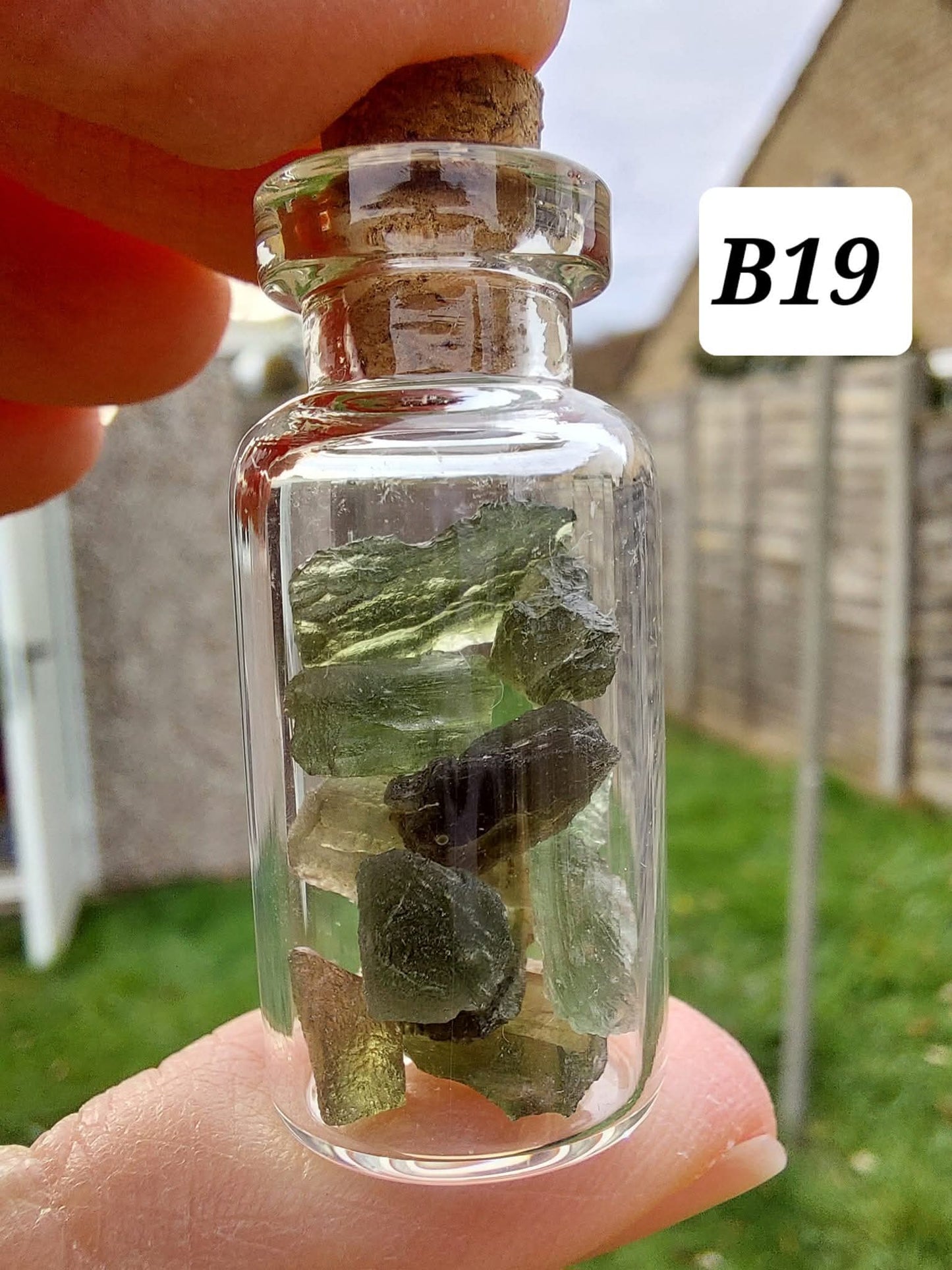 Moldavite chips (2.50g) in 3ml glass Bottle, Tektite (Ref: B19)