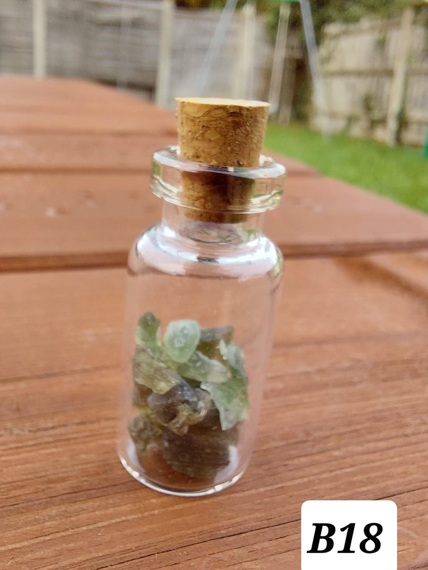 Moldavite chips (2.00g) in 3ml glass Bottle, Tektite (Ref: B18)